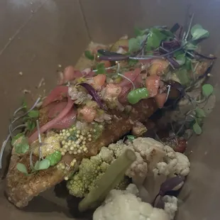 Brisket empanada with pickled cauliflower, onions, jalapeño, and other veggies