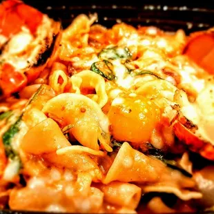 Lobster alla Vodka: Maine lobster, campanelle, spinach, pearl onion, roasted tomato, spicy tomato cream, Parmigiano-Reggiano. $38.00