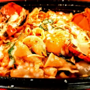 Lobster alla Vodka: Maine lobster, campanelle, spinach, pearl onion, roasted tomato, spicy tomato cream, Parmigiano-Reggiano. $38.00