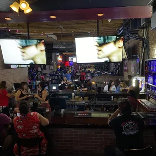 people sitting at the bar