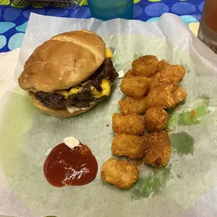 The Library Bar &amp; Grill&apos;s double cheeseburger with tater tots