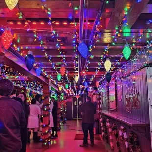 people walking down the hallway