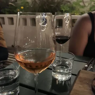 several glasses of wine on a table