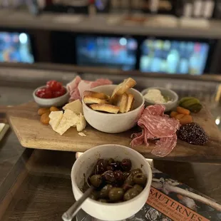 Charcuterie board and Marinated Olives.