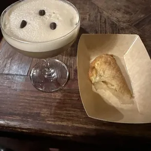 Espresso martini and crawfish empanada