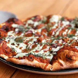 BBQ Chicken Pizza with garden herbs and coconut ranch