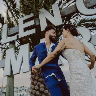 Couple Photos by the Glen Cove Marina sign (photo by Love &amp; Wolves Co.)