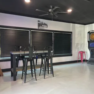 a restaurant with tables and chairs