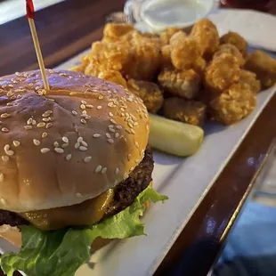 a hamburger and fries on a plate