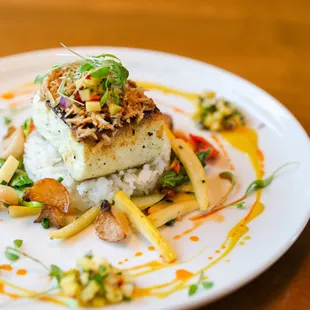 a plate of food on a wooden table