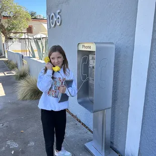 Musical yellow pay phone-Lincoln street side