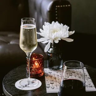 two glasses of wine on a table