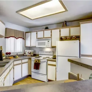 Kitchen with wood-style flooring