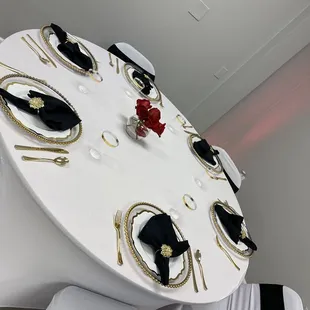 Black and gold set up with a splash of red