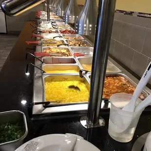 a buffet full of food