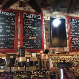 menus on a brick wall