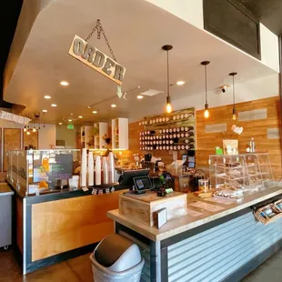 a coffee shop with a counter