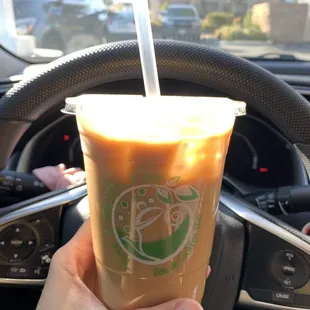 Iced vanilla latte with oat milk