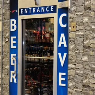 the entrance to a bar