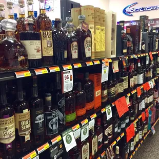 a variety of liquor bottles