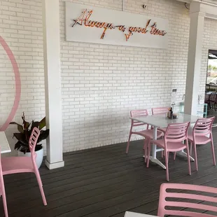 pink chairs and tables
