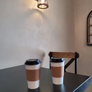 two cups of coffee on a table