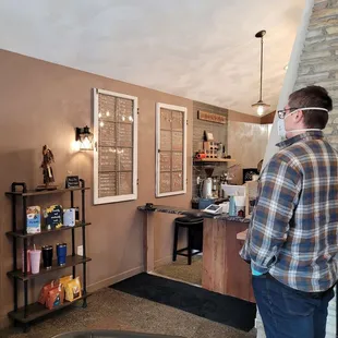 a man standing in front of the counter