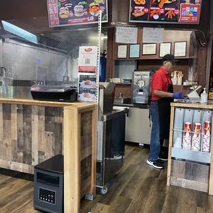 a man standing at the counter