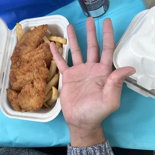 My husbands hand compared to the portion. He couldn&apos;t believe it.