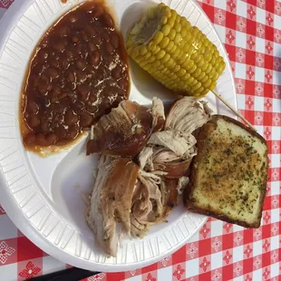 Pulled chicken, baked beans and corn on the cob