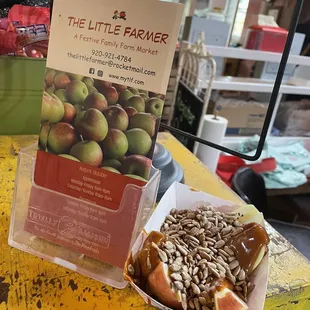 a box of apples and a bagel