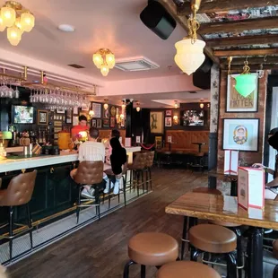 people sitting at the bar