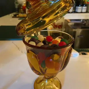 Not my cup of tea, but the pub has candy dish throughout the pub.