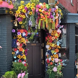 the entrance decorated with flowers