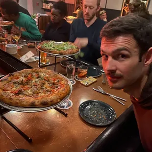 My brother with our pizza