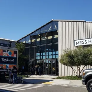 a truck parked in front of a building