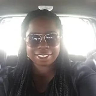 Genevieve M.