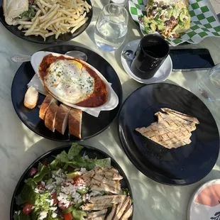 Shakshuka, Greek goddess, grilled chicken sandwich, Greek salad with chicken