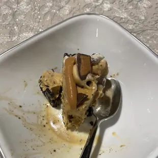 a plate of food with a spoon