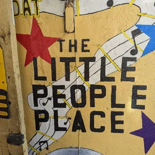 a door with a sign painted on it