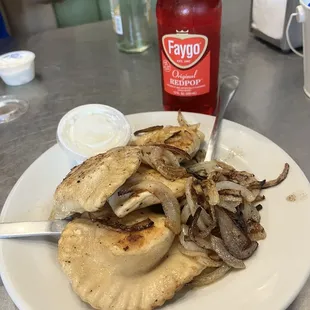 Pierogi with onion, and a faygo red pop.