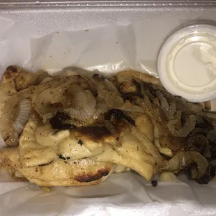 Pierogi mix happiness with onions and sour cream