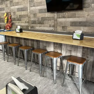 a bar with stools