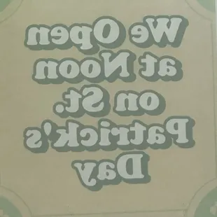 I'm inside taking the pic of the sign. 3/17/2024...appropriate being backwards. Shamrock opens at noon on 3/17/24.