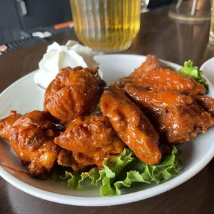 Wings with buffalo sauce and whipped blue cheese