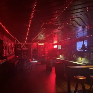 a bar with red lights