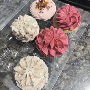 Gf vegan cupcakes - rose pistachio, chocolate cookies and cream and vanilla blackberry.