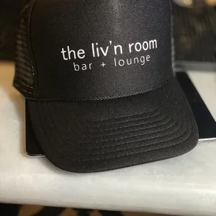 a black hat on a counter