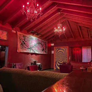 a bar with a chandelier