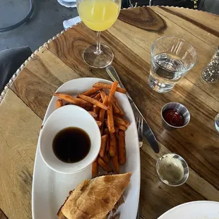 Remains of  Prime Rib French Dip Sandwich